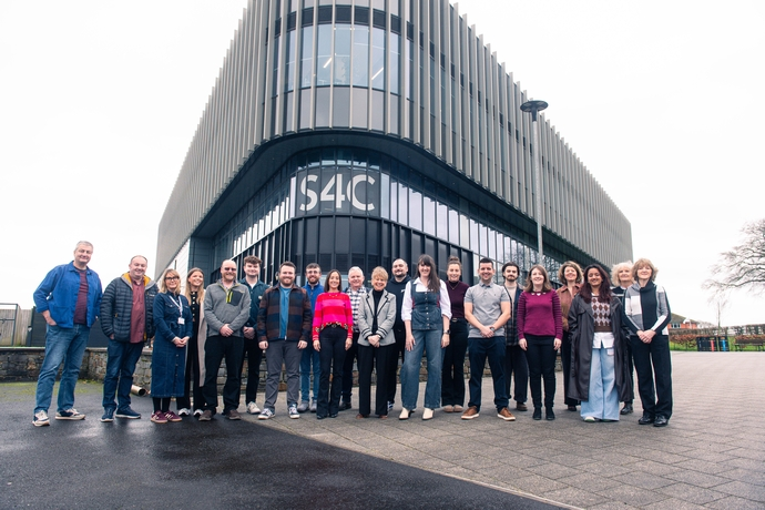 Telesgop staff standing outside of the Yr Egin building